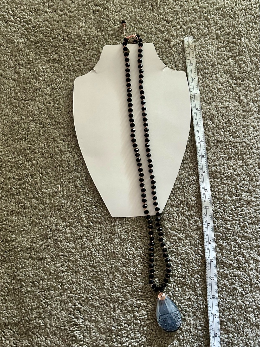 Black Beaded Necklace with Blue Teardrop Pendant